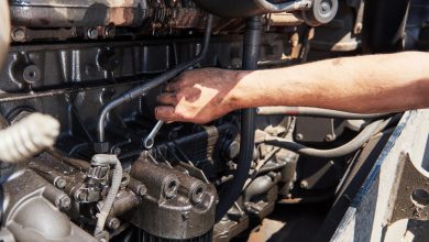 a mechanic checking car reconditioned cylinder head